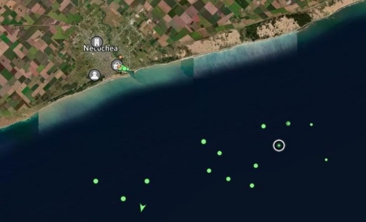 Imagen satelital de los buques en espera en Quequén.	CPPC