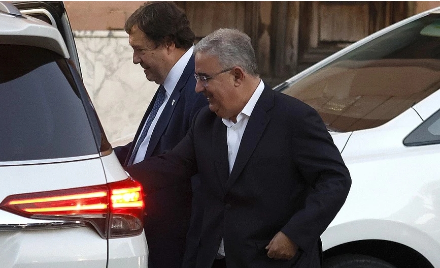 Jalil saliendo de la Casa Rosada con Weretilneck
